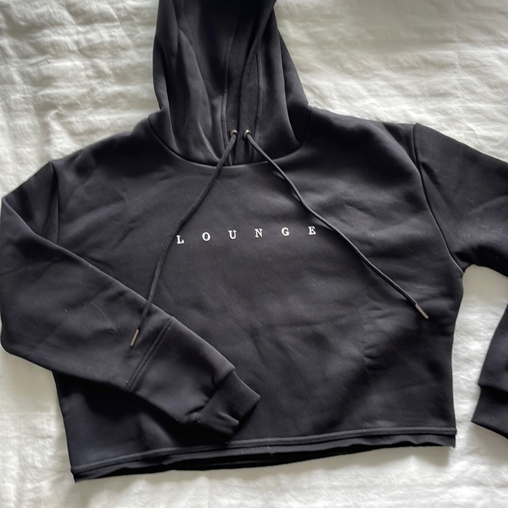 Cropped hoodie with rubber raised logo. Never worn